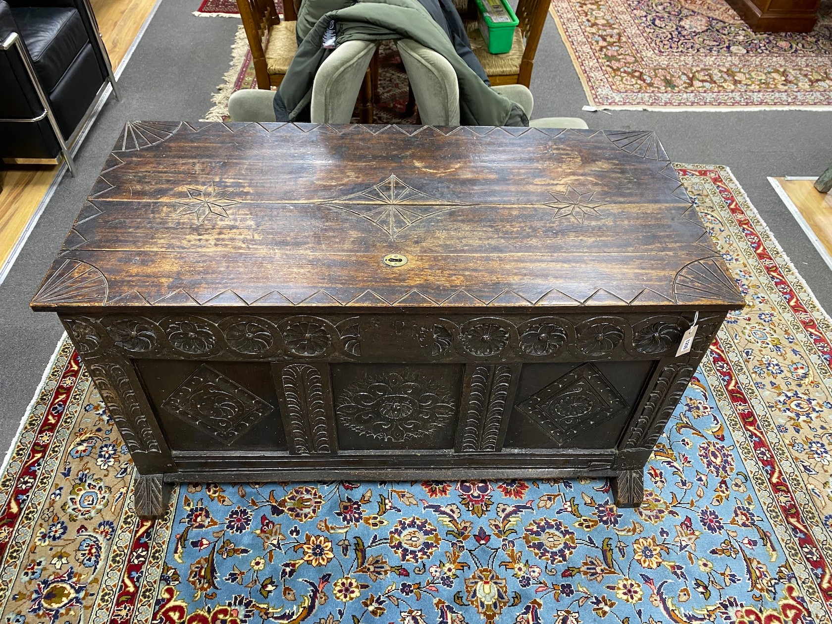 A 17th century oak coffer, altered, width 128cm, depth 59cm, height 69cm
